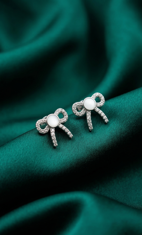 Celeste Bow Spark Studs π