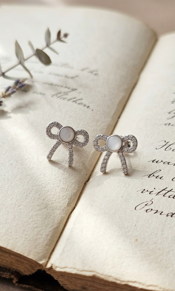 Celeste Bow Spark Studs 🎀